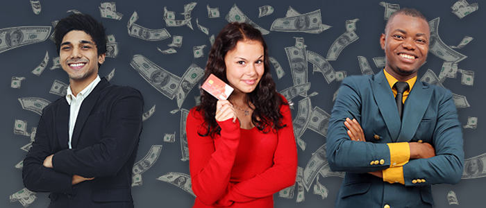 Three adults standing behind cash in the air
