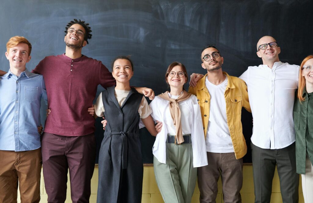 A group of happy employees taking part in a points-based incentive program