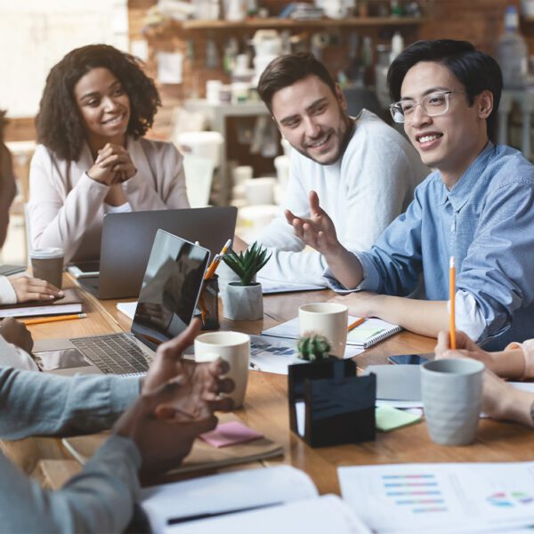 A group of people in a business meeting