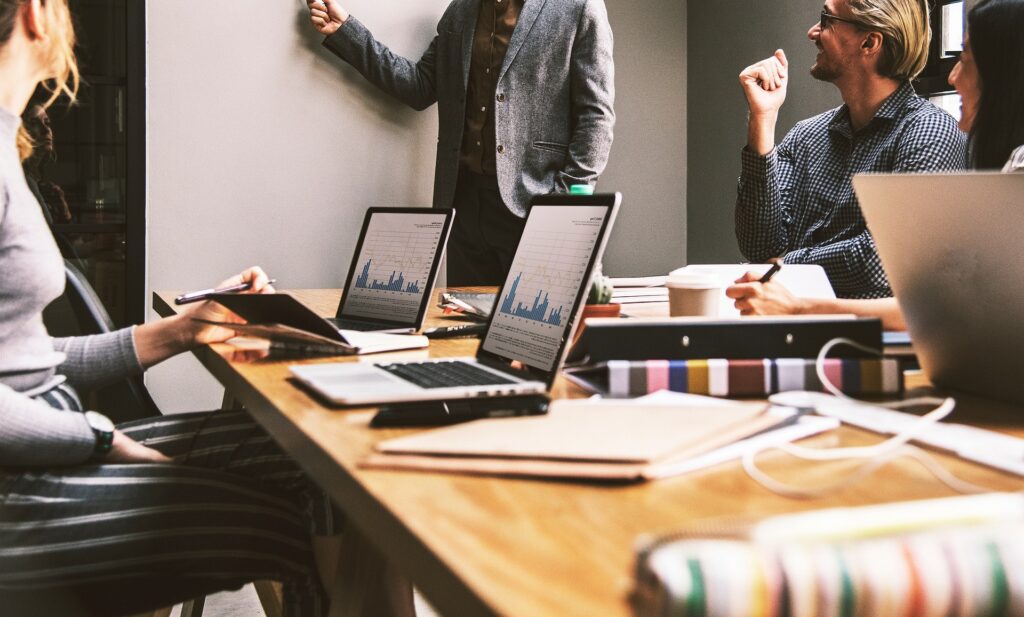 A group of people in a business meeting