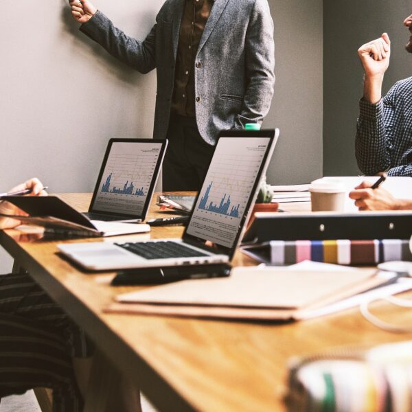 A group of people in a business meeting