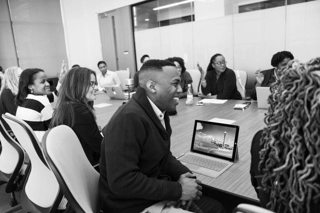 A group of employees in a meeting