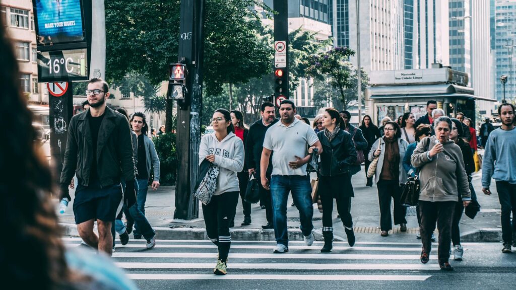 A group of people walking outside