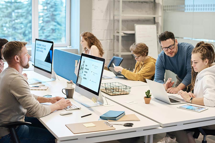 A group of people browsing their employers’ digital incentives catalog